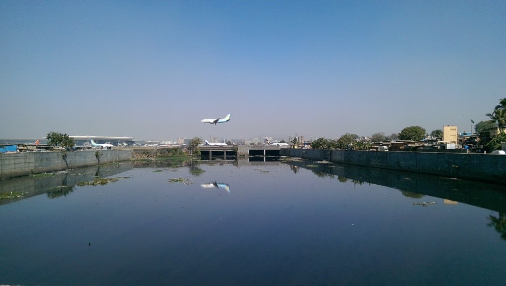 View of the bounded Mithi River next to the Mumbai International Airport. Photo: Hans Adam.