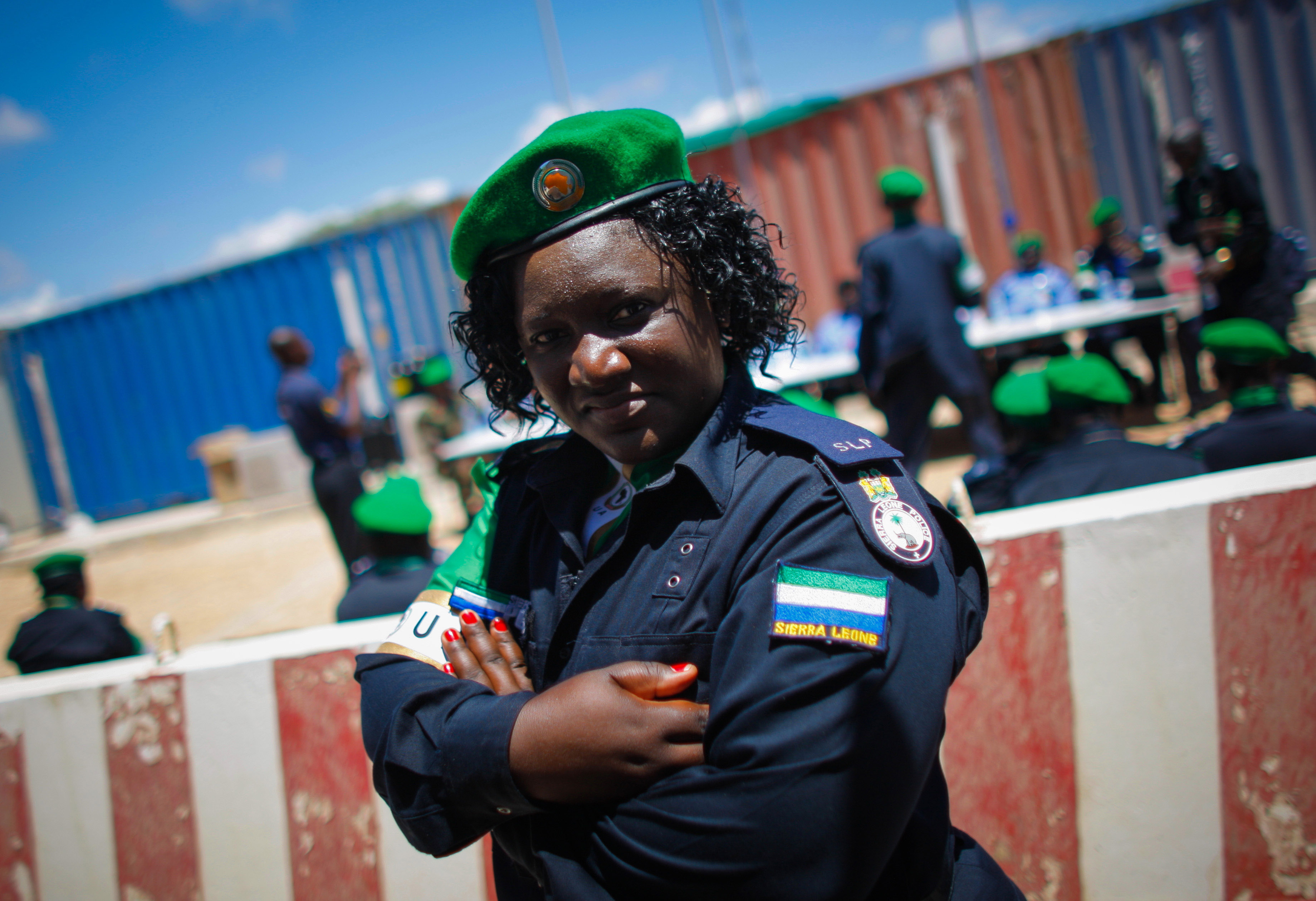 Officer from the Sierra Leonean Contingent serving with the African Union Mission in Somalia (AMISOM) Individual Police Officers (IPO) stands following a medal parade at the AU Mission's headquarters in the Somali capital Mogadishu, where they have been central in assisting the reforming of the Somali Police Force (SPF) as it rebuilds after two decades of conflict and instability. Photo: Stuart Price/AMISOM Public Information via Flickr